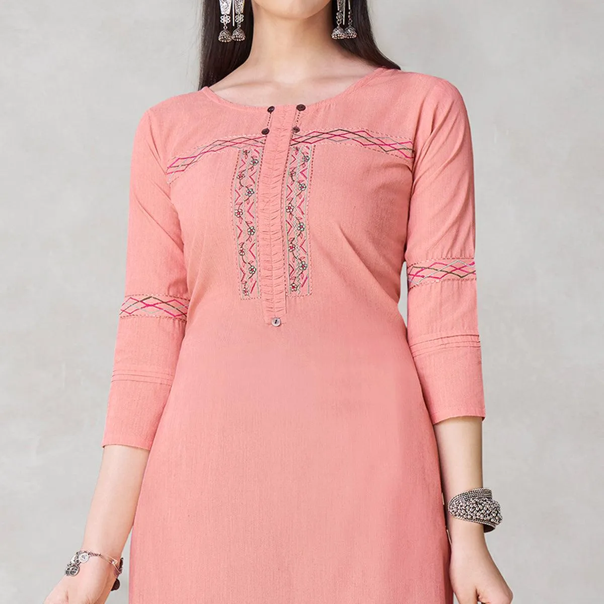Glorious Peach Colored Partywear Embroidered Viscose Kurti
