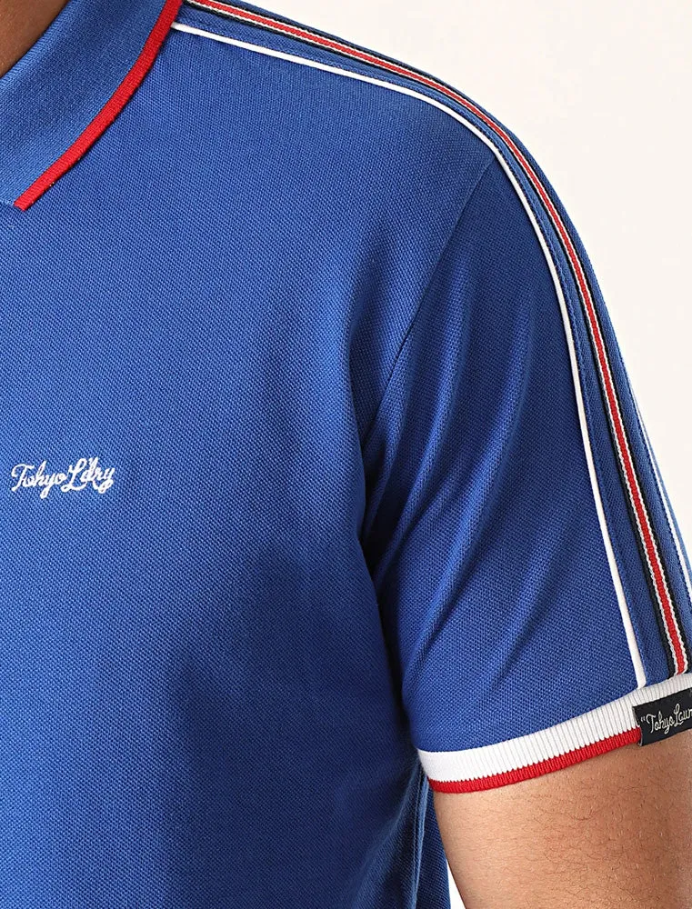 Hitch Cotton Pique Polo Shirt with Stripe Tape Detail In Sea Surf Blue - Tokyo Laundry