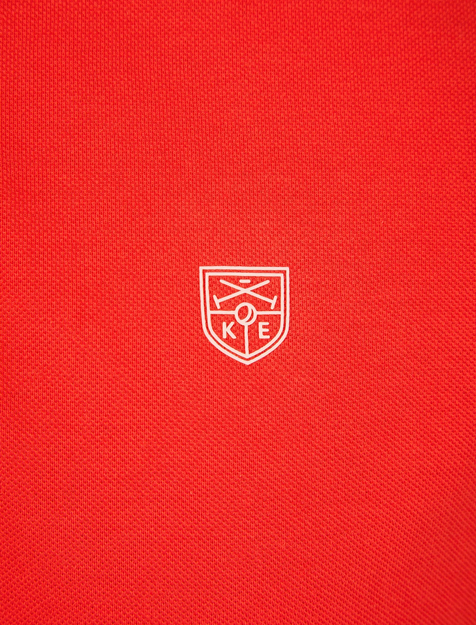 Saints Cotton Pique Polo Shirt in Cayenne - Kensington Eastside